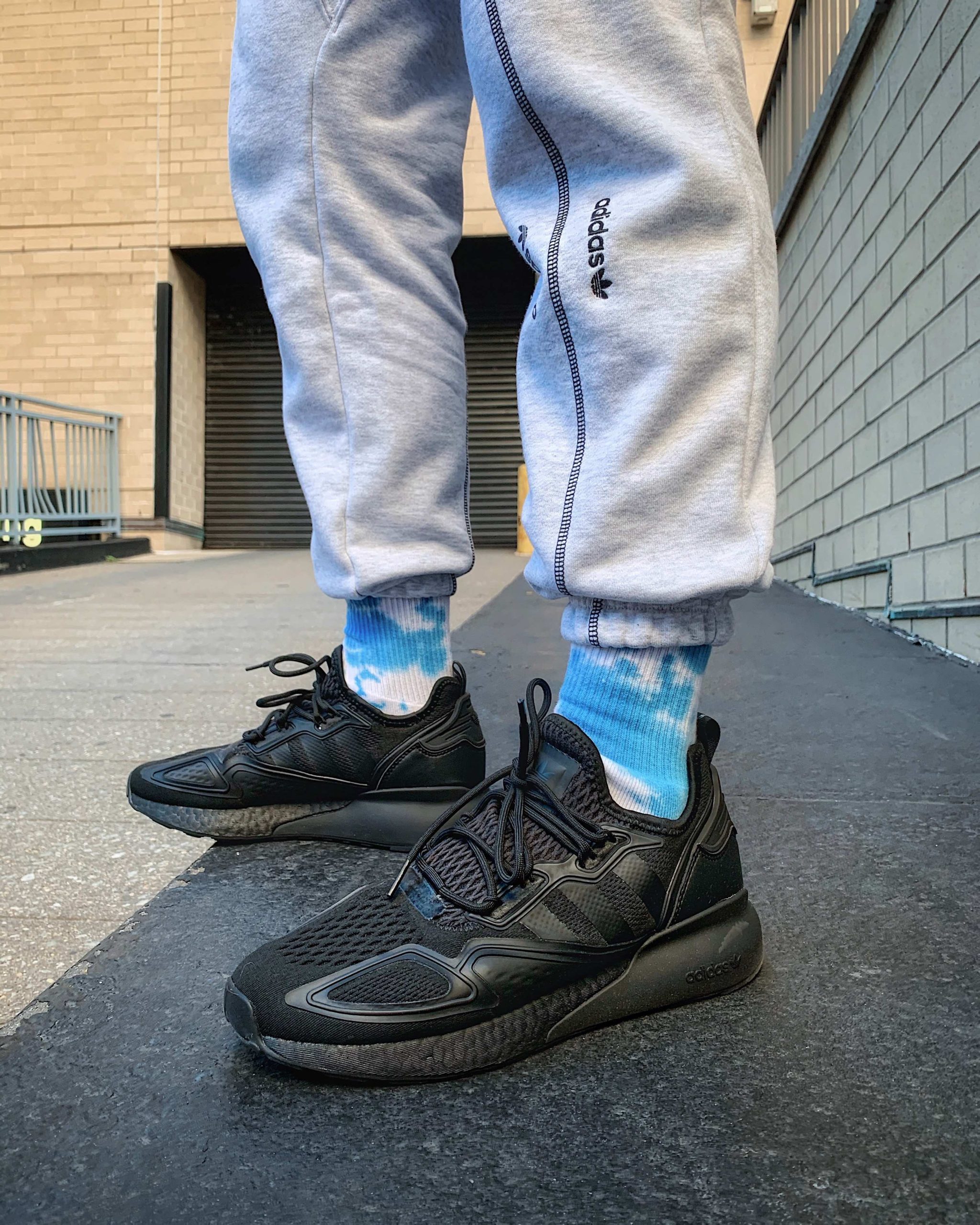 adidas zx 2k boost black street style on feet